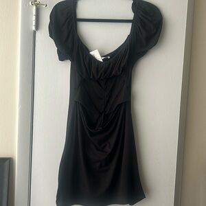 Black mini dress with cut out mid section never worn